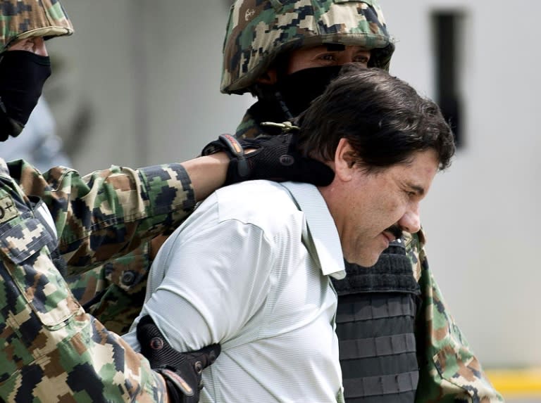 Mexican drug trafficker Joaquin Guzman Loera aka "el Chapo Guzman" escorted by marines in Mexico City