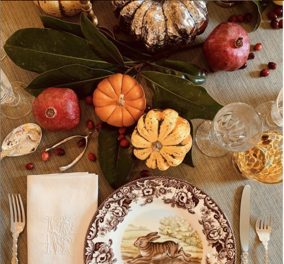 <p>Not only is there a beautiful mix of seasonal fruits and vegetables in this centerpiece by Keith Meacham of <a href="https://www.reedsmythe.com/" rel="nofollow noopener" target="_blank" data-ylk="slk:Reed Smythe;elm:context_link;itc:0;sec:content-canvas" class="link ">Reed Smythe</a>, there's also a great combination of materials, from real pumpkins to gilded ones. Scattered cranberries are a nice touch that adds color and personality to the table. </p><p> "I’d love to say there was lots of inspiration for this table, but it was mostly inspired by necessity," says Meacham. "I was late getting a plan together and was cooking the whole Thanksgiving meal myself, so I turned to what was on hand in the garden and in the produce aisle: dark green magnolia leaves with velvet brown undersides, some crazy bittersweet vine, fresh red cranberries, pomegranates, pears, pumpkins, and apples. I mixed them with silver pieces I pull out every Thanksgiving: my treasured <a href="https://www.reedsmythe.com/product/wishbone/" rel="nofollow noopener" target="_blank" data-ylk="slk:Sterling Wishbone;elm:context_link;itc:0;sec:content-canvas" class="link ">Sterling Wishbone</a>, a gift from my friend Julia which we sell at Reed Smythe, silver pumpkins and corn from <a href="https://creelandgow.com/" rel="nofollow noopener" target="_blank" data-ylk="slk:Creel & Gow;elm:context_link;itc:0;sec:content-canvas" class="link ">Creel & Gow</a>, silver candlesticks and <a href="https://www.reedsmythe.com/product/sterling-silver-clam-shell-dish/" rel="nofollow noopener" target="_blank" data-ylk="slk:SilverClam Shell Salt Dish;elm:context_link;itc:0;sec:content-canvas" class="link ">SilverClam Shell Salt Dish</a>, some antique and others from Reed Smythe. Together with my Spode china, monogrammed French linens from the French flea markets, and <a href="https://www.reedsmythe.com/product/tortoise-high-ball-glass/" rel="nofollow noopener" target="_blank" data-ylk="slk:tortoiseshell glasses;elm:context_link;itc:0;sec:content-canvas" class="link ">tortoiseshell glasses</a>, it all sort of worked with minimum fuss."</p>