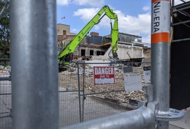 Demolition makes way for a new condo in Toronto. The Bank of Canada says the economy looks good, but warned of danger if there is a 'pronounced slowing' in Canada's real estate market instead of a moderate cooling. (Don Pittis/CBC - image credit)