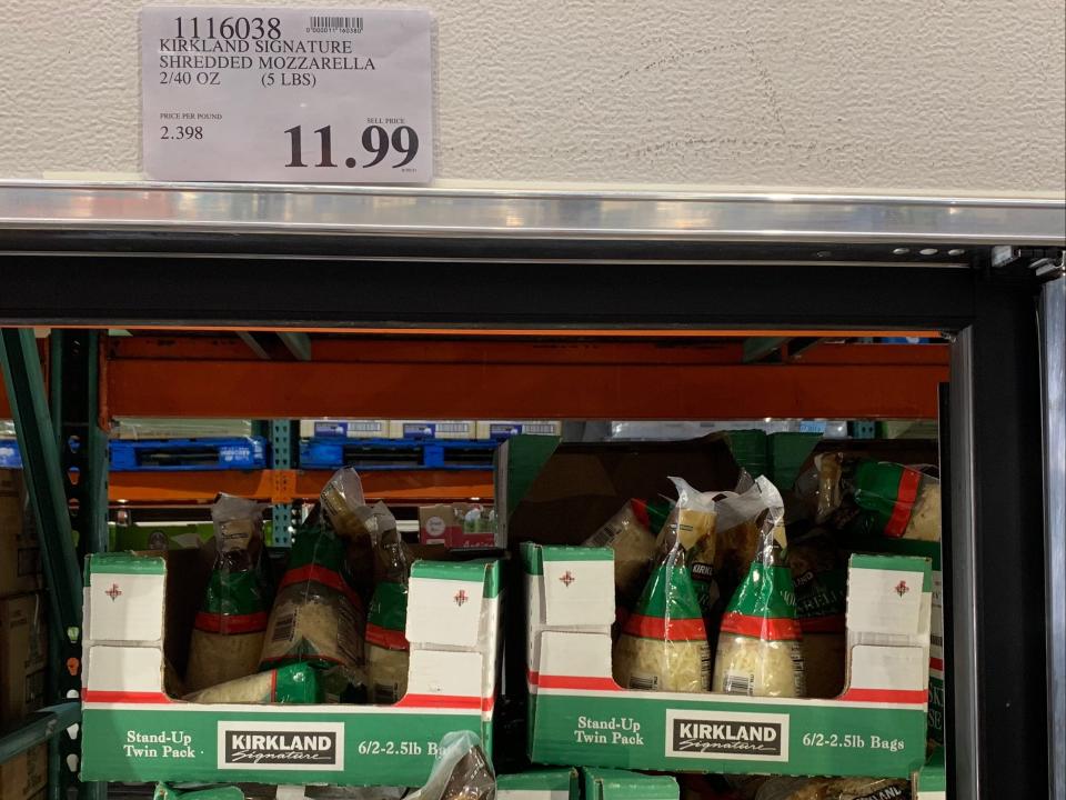 packages of mozzarella cheese in a cooler at costco