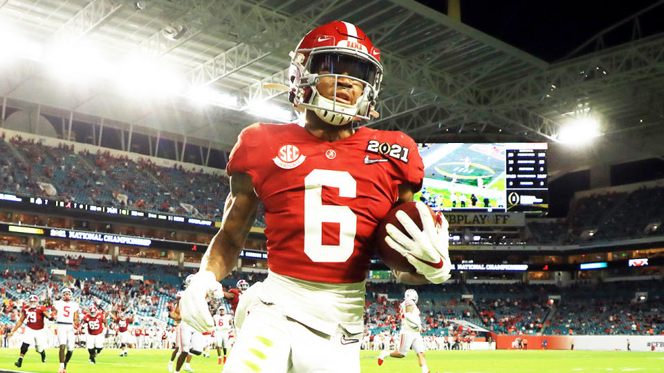 DeVonta Smith (pictured) running in a touchdown for Alabama in their national championship victory.