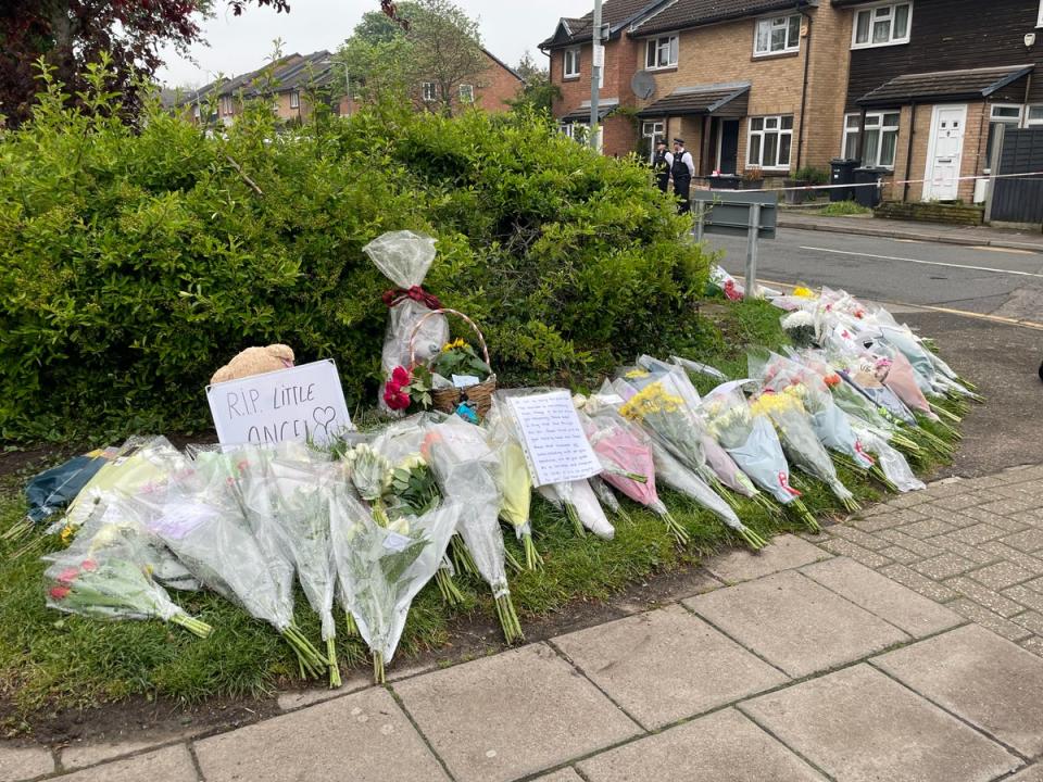 Flowers placed at the scene in Hainault, north east London, where 14-year-old Daniel Anjorin was killed (Samuel Montgomery/PA Wire)