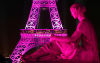 <p>The Eiffel Tower is illuminated with a pink light, as part of the 'Ruban Rose’ event in Paris, France. (Photo: Getty Images)<br></p>