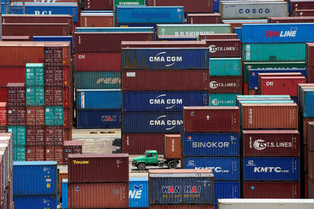 Shipping containers are seen at a port in Shanghai, China July 10, 2018. REUTERS/Aly Song/Files