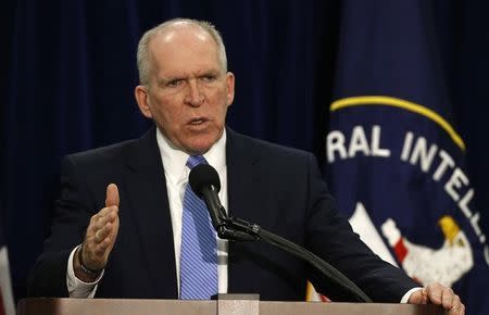 Director of the Central Intelligence Agency John Brennan makes a point while he holds a rare news conference at the CIA Headquarters in Virginia December 11, 2014. REUTERS/Larry Downing