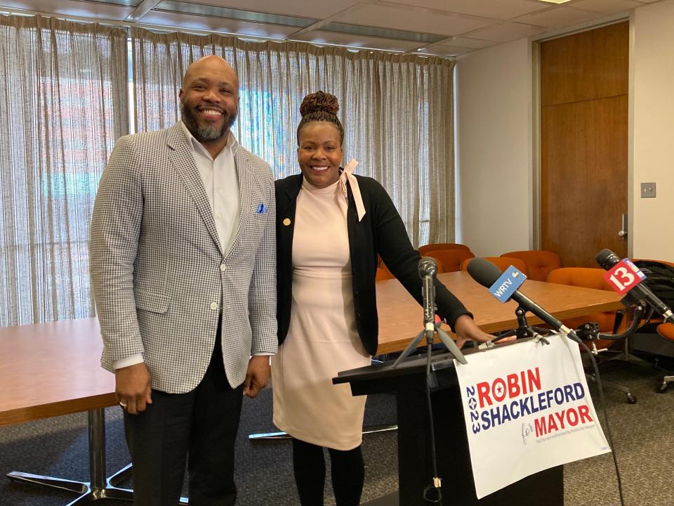 Gregory Meriweather poses with Democratic State Rep. Robin Shackleford, who lost in the primary mayoral election in May.