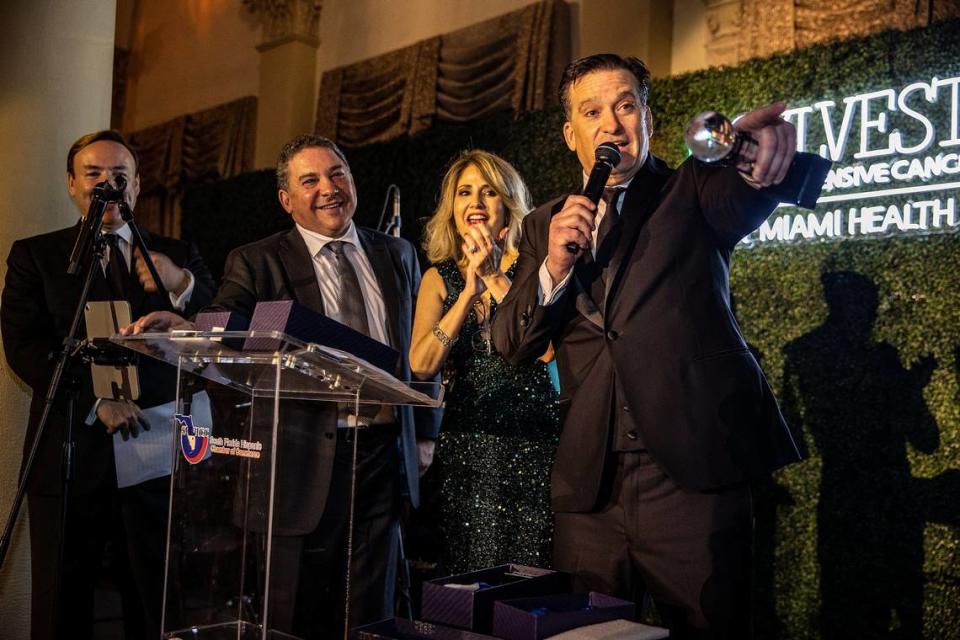 Radio personality Javier Romero, far left, joined Roland Sanchez-Medina Jr., Chairman, and Liliam M. Lopez, President-CEO, of the South Florida Hispanic Chamber of Commerce, as they presented Fred Voccola, Kaseya CEO, with the SFLHCC’s Global Excellence in Technology & Innovation Award during the SFLHCC Havana in the 50s Gala at the Biltmore Hotel in Coral Gables on Friday, Feb. 24, 2023.