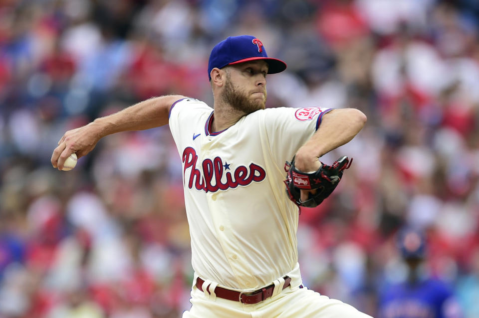 Philadelphia Phillies starting pitcher Zack Wheeler throws during the first inning of a baseball game against the New York Mets, Sunday, Aug. 8, 2021, in Philadelphia. (AP Photo/Derik Hamilton)