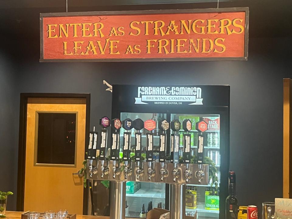 "Our bar manager put up this sign, "Enter as Strangers, Leave as Friends," said Fordham and Dominion Brewing bartender Novalee Roy on Dove August 6, 2023. "And it's true. That's what happens." The brewery will close in 2023, staff learned in July.