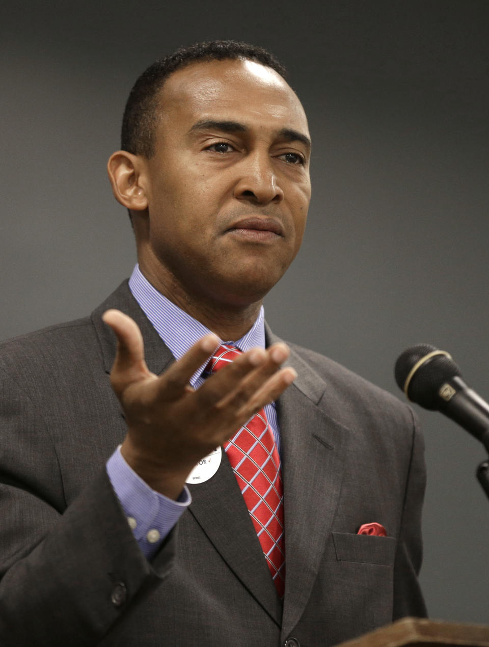 FILE - In this Oct. 29, 2013, file photo, candidate for Charlotte mayor Patrick Cannon speaks to students at Queens University in Charlotte, N.C. Cannon, now mayor of Charlotte, was arrested Wednesday, March 26, 2014, on public corruption charges. U.S. Attorney Anne Tompkins says that Cannon solicited and accepted bribes from undercover FBI agents posing as real estate developers who wanted to do business in Charlotte. (AP Photo/Chuck Burton, File)