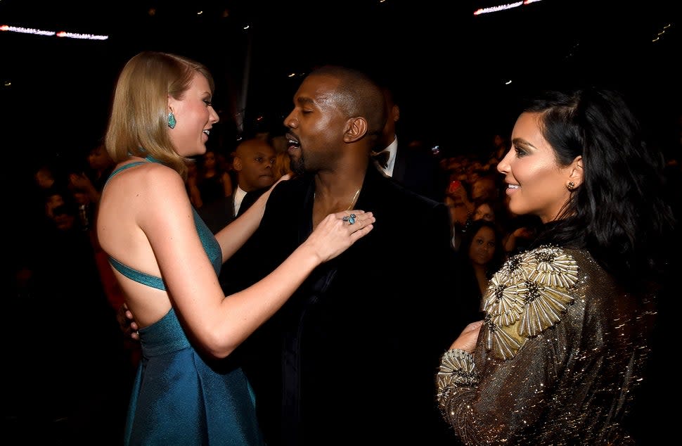 Taylor Swift, Kanye West and Kim Kardashian attend The 57th Annual GRAMMY Awards at the STAPLES Center on Feb. 8, 2015 in Los Angeles, California. 