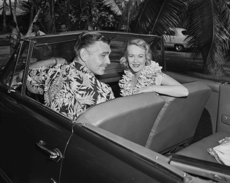 <p>You can probably guess by the actor and model's tropical shirts and leis where they honeymooned: beautiful Hawaii, of course.</p>