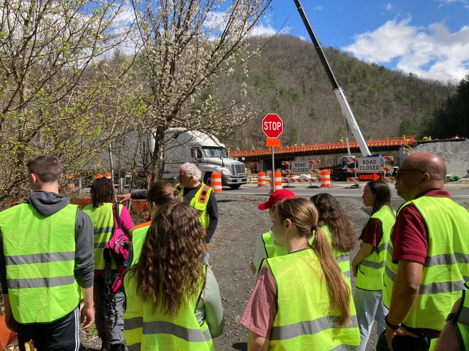 Jeff Hunter explained details of the construction work going on at the Harmon Den exit on Interstate 40 to students from several universities in late March.