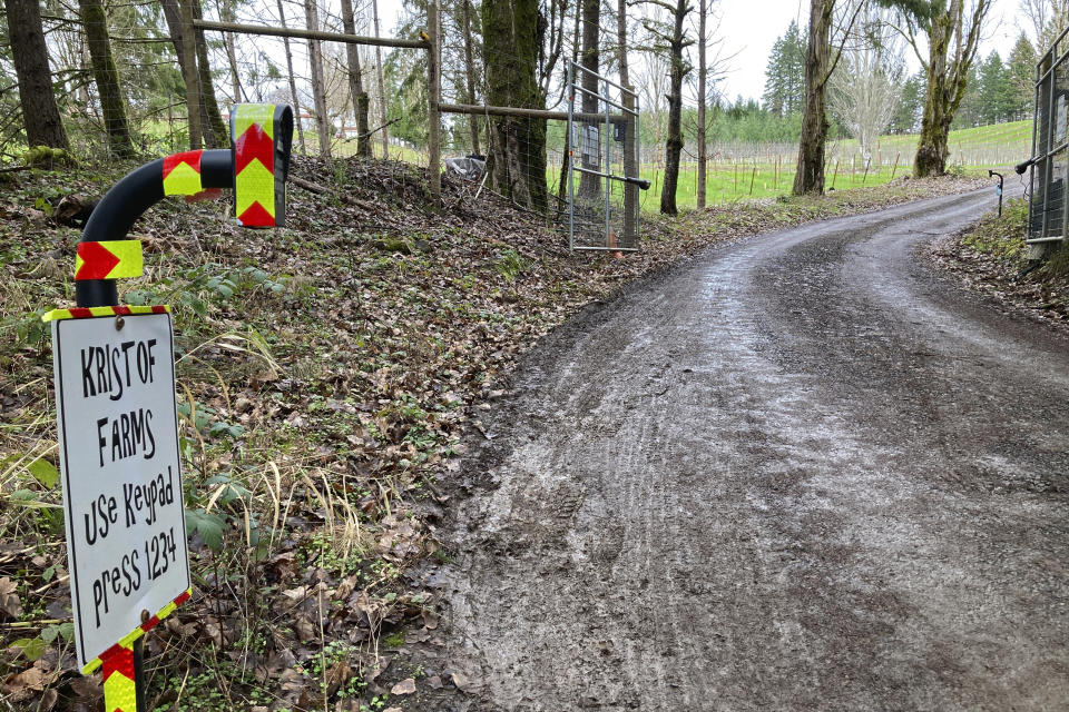 The entrance to Nicholas Kristof's family farm near Yamhill, Oregon, is seen on Friday, Jan. 21, 2022. Kristof resigned from the New York Times last year to run for governor, but the celebrated journalist was declared ineligible for not meeting the three-year residency requirement. Kristof, who grew up in Oregon, has gone to the state Supreme Court to fight the decision. (AP Photo/Andrew Selsky)