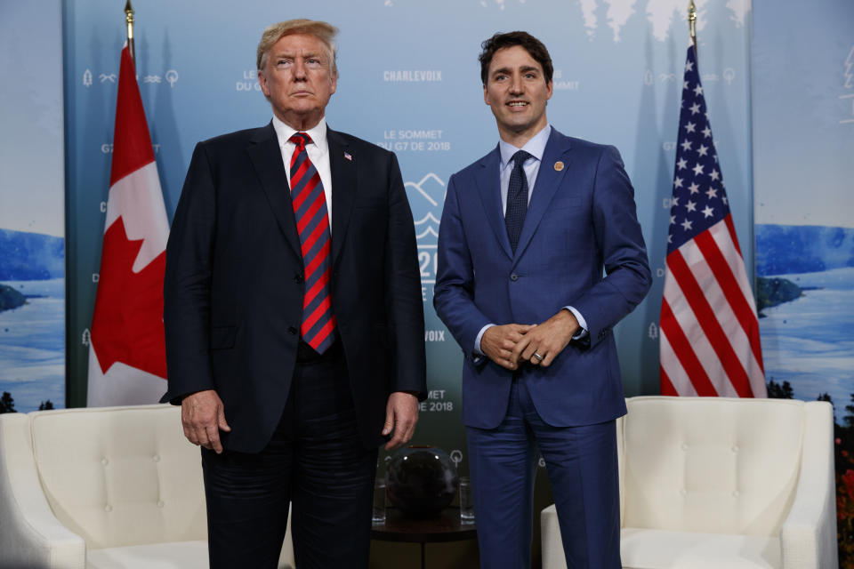 In this June 8, 2018 file photo, U.S. President Donald Trump meets with Canadian Prime Minister Justin Trudeau at the G-7 summit in Charlevoix, Canada. (AP Photo/Evan Vucci, File)