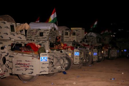 Peshmerga forces gather on the east of Mosul during preparations to attack Mosul, Iraq, October 16, 2016. REUTERS/Azad Lashkari