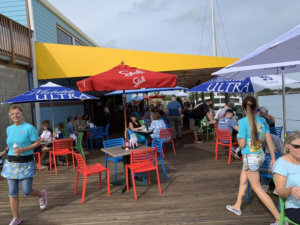 The new River Deck New Smyrna Beach restaurant is busy even after lunchtime on Tuesday afternoon, Jan. 26, 2021. The eatery at 107 N. Riverside Drive, just north of Canal Street, opened on Jan. 22.