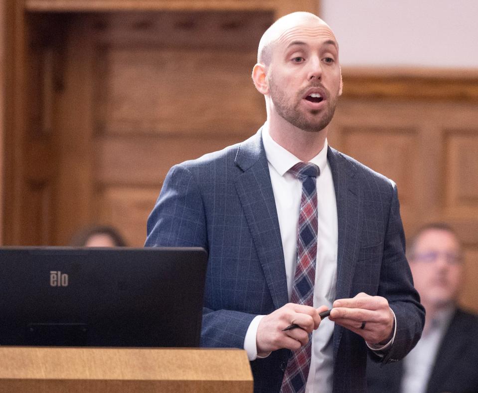 Assistant Stark County Prosecutor Richard V. Nicodemo questions Steven Q. Troyer's widow Glenda Troyer in Judge Frank Forchione's courtroom during the trial of Damon Mitchell on Tuesday.