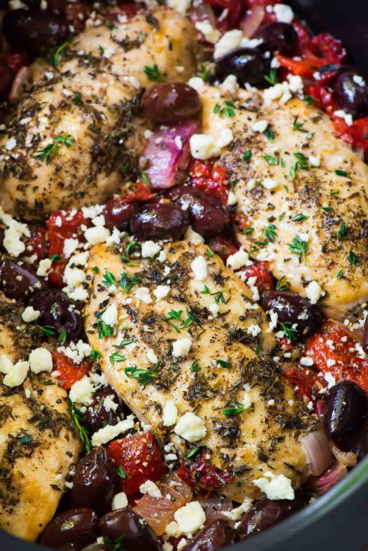 <p>This juicy chicken has bright Mediterranean flavors, including olives, roasted red peppers, and feta. Get this <a href="https://www.wellplated.com/greek-chicken/" rel="nofollow noopener" target="_blank" data-ylk="slk:Slow Cooker Greek Chicken;elm:context_link;itc:0;sec:content-canvas" class="link ">Slow Cooker Greek Chicken</a> recipe!</p>