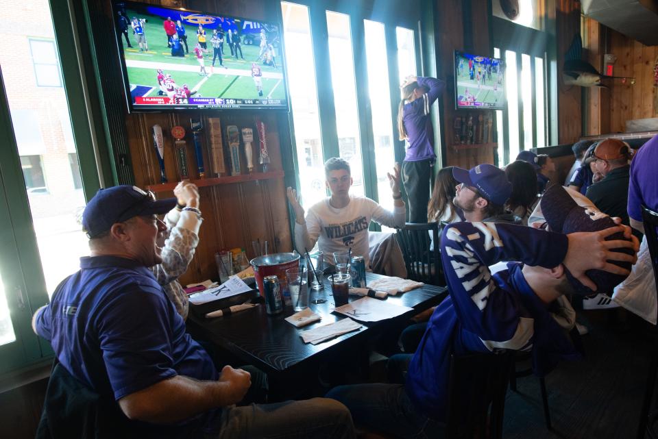 Kansas State fans reacted after the Wildcats missed a touchdown opportunity on a fourth down Saturday in the first quarter of the Sugar Bowl against Alabama.