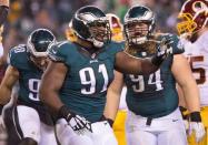 Dec 26, 2015; Philadelphia, PA, USA; Philadelphia Eagles defensive end Fletcher Cox (91) reacts after a sacking Washington Redskins quarterback Kirk Cousins (not pictured) during the third quarter at Lincoln Financial Field. Mandatory Credit: Bill Streicher-USA TODAY Sports