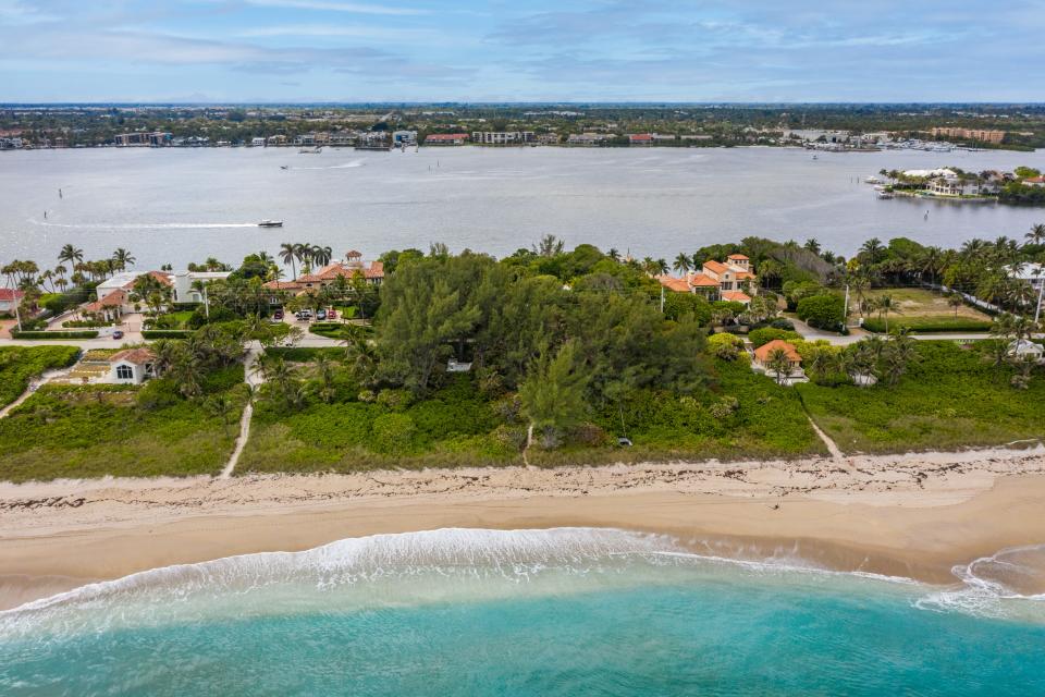 At 1860 S. Ocean Blvd. in Manalapan, an ocean-to-lake estate obscured by dense trees in the center of the photo has sold for a land value price of $26.775 million, according to the multiple listing service. The property comprises 2½ acres.