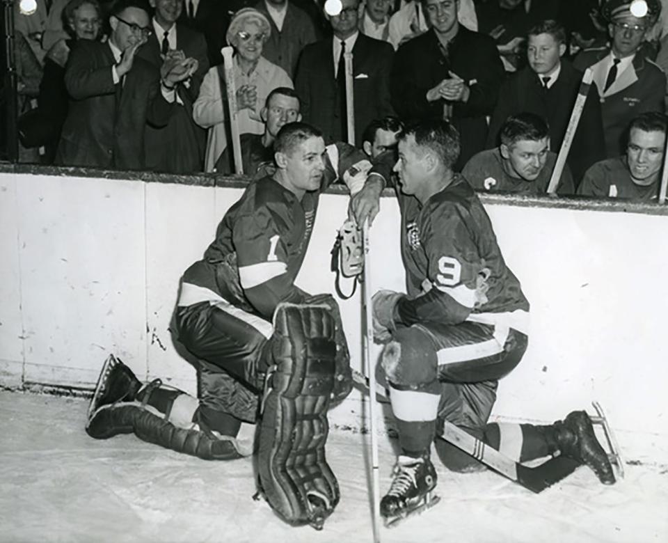 Goalie Terry Sawchuk and Gordie Howe confer during a break in play after Howe’s famous goal.