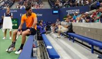 Aug 31, 2018; New York, NY, USA; Juan Martin del Potro of Argentina sits and complains about a fan's calling the ball "out" during play against Fernando Verdasco of Spain in a third round match on day five of the 2018 U.S. Open tennis tournament at USTA Billie Jean King National Tennis Center. Mandatory Credit: Robert Deutsch-USA TODAY Sports