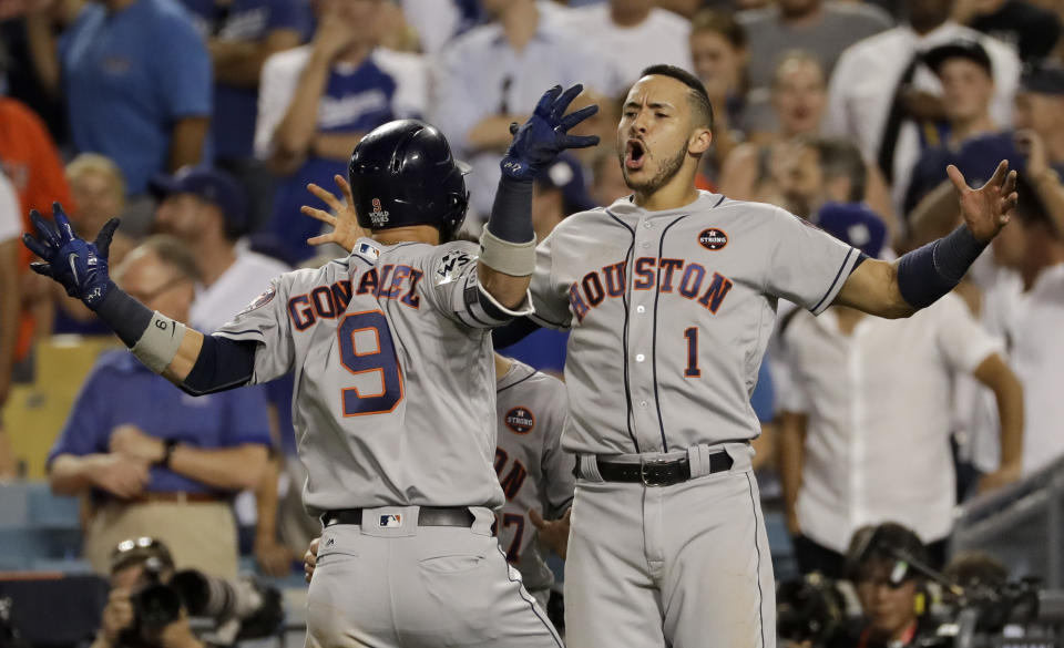 Astros' left fielder Marwin Gonzalez celebrates his game-tying home run in the ninth inning of World Series Game 2. (AP)