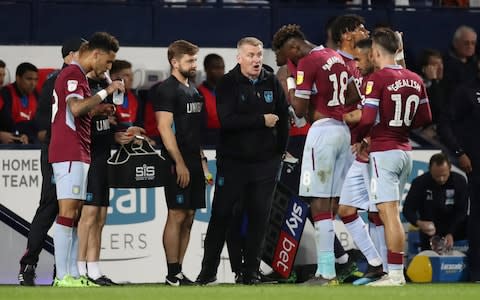 Dean Smith speaks to his Villa players - Credit: Reuters