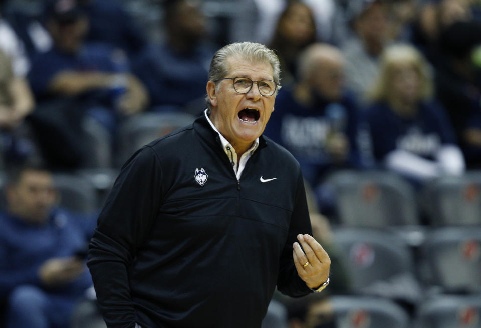 Connecticut head coach Geno Auriemma shouts at his team during the first half of an NCAA college basketball game against UCLA in Newark, N.J., Saturday, Dec. 11, 2021. (AP Photo/Noah K. Murray)