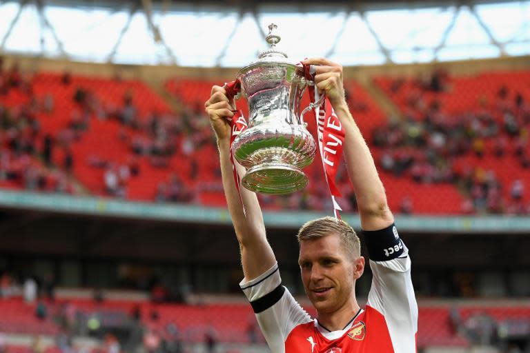 Per Mertesacker in talks with Arsenal over non-playing role when he retires