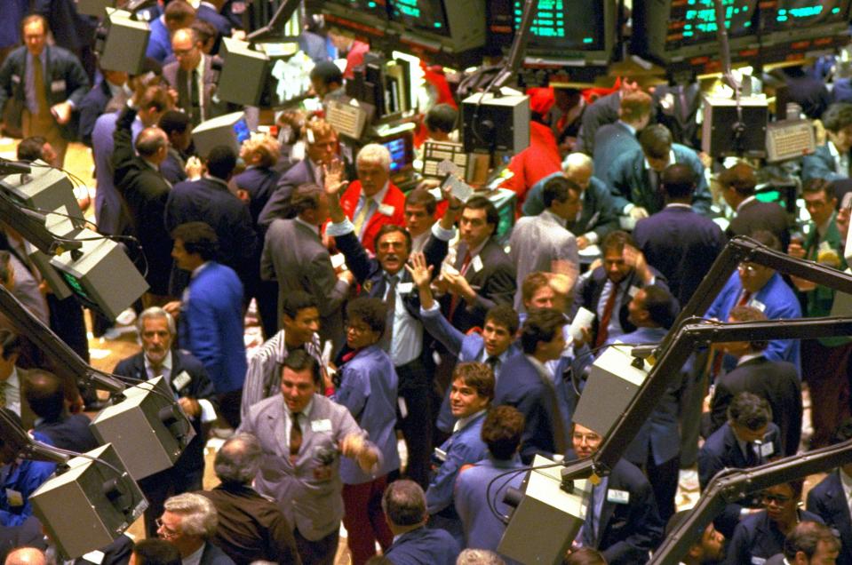 Traders on the floor of the New York Stock Exchange work frantically in this Oct. 19, 1987 file photo as the Dow Jones Industrial average plunged more than 500 points for a loss of 22.62 percent. In the 20 years since one of Wall Street's worst crashes, the markets have grown bigger, more complex and faster. Investors have become increasingly aggressive, whether buying or selling. So while Wall Street was devastated by a 508-point plunge in the Dow Jones industrials on Oct. 19, 1987, a drop of that size today, while much smaller on a percentage basis, remains frightening. 