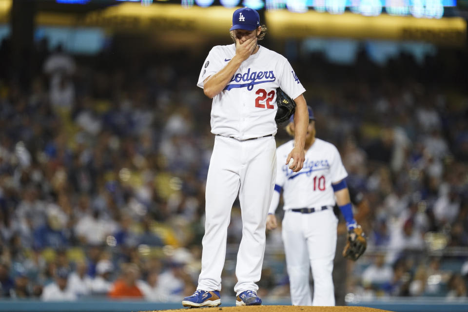 Los Angeles Dodgers starting pitcher Clayton Kershaw (22) reacts on the mound before he exits the game during the second inning of a baseball game against the Milwaukee Brewers Friday, Sept. 1, 2021, in Los Angeles. (AP Photo/Ashley Landis)