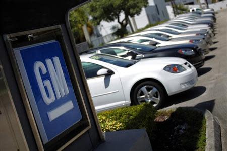 Chevrolet cars are seen at a GM dealership in Miami, Florida August 12, 2010. REUTERS/Carlos Barria