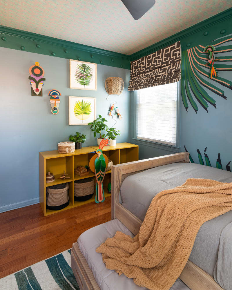 Cubby shelf in colorful bedroom.