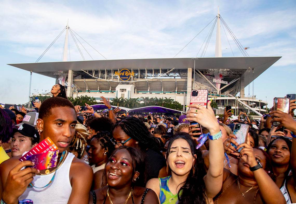 Miami Gardens’ Hard Rock Stadium, home of the Miami Dolphins, attracts music and sports fans year round. Above: Maskless concertgoers gather during the third day of Rolling Loud Miami, an international hip-hop festival, at Hard Rock Stadium in Miami Gardens on July 25, 2021.