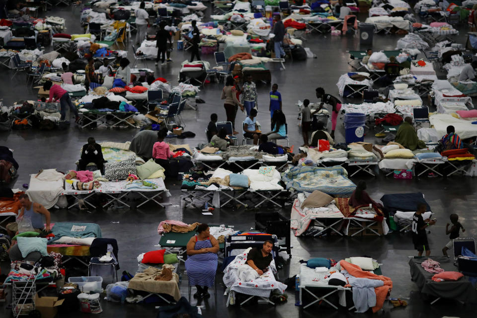 After Hurricane Harvey struck the Houston area, evacuees find shelter at the George R. Brown Convention Center. Many evacuees did not have time to grab medications before having to flee the floodwaters. (Photo: Carlos Barria / Reuters)