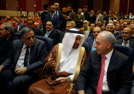 Saudi oil minister Khalid al-Falih and Iraq minister Salman Ali Al Jumaily (R) talk before the opening of Baghdad International Exhibition, Baghdad, Iraq October 21, 2017. REUTERS/Khalid al-Mousily