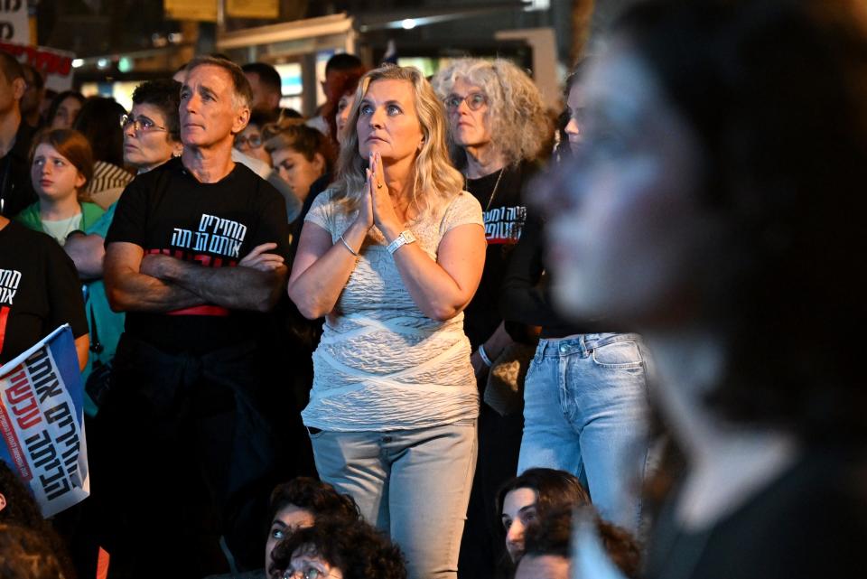 Families of hostages and their supporters await news anxiously over who will be released (Getty Images)