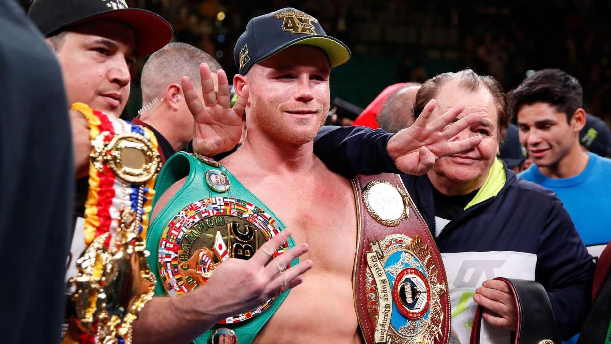 Mandatory Credit: Photo by John Locher/AP/Shutterstock (10464384y)Canelo Alvarez poses for photos after defeating Sergey Kovalev by knockout in a light heavyweight WBO title bout, in Las VegasAlvarez Kovalev Boxing, Las Vegas, USA - 02 Nov 2019.