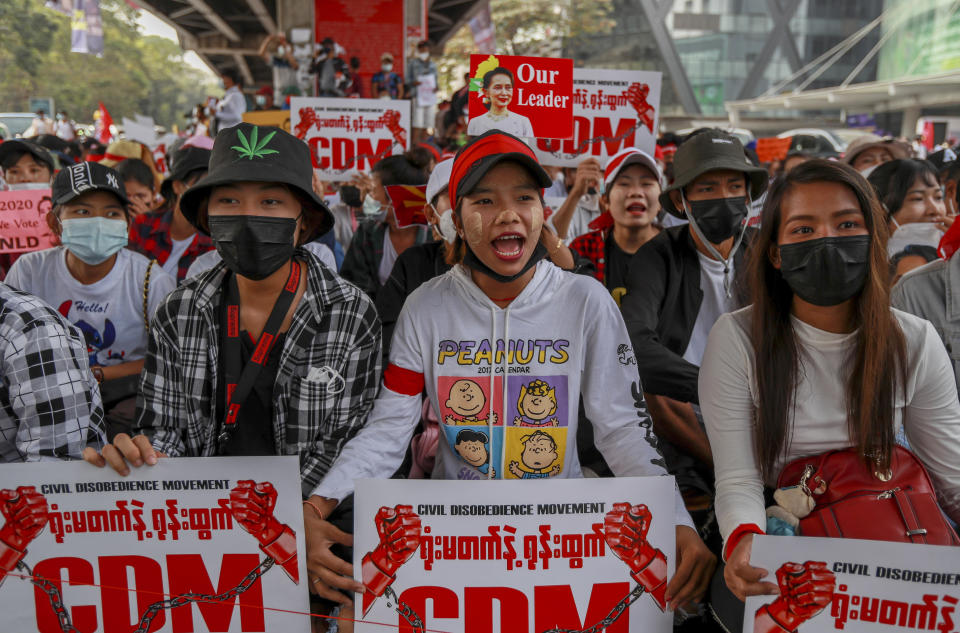 Demonstrators display placards with CDM, refers to the civil disobedience movement that has seen doctors, engineers and others in Myanmar refuse to work until the military releases elected political leaders and returns the country to civilian rule, during a protest against the military coup in Yangon, Myanmar Thursday, Feb. 18, 2021. Demonstrators against Myanmar’s military takeover returned to the streets Thursday after a night of armed intimidation by security forces in the country’s second biggest city. (AP Photo)