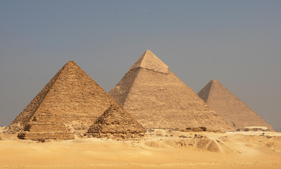 A view of the Pyramids at the Giza Plateau. From left to right is the Pyramid of Menkaure, the Pyramid of Khafre and the Great Pyramid at Giza in Cairo, Egypt.  (Alex Livesey / Getty Images)