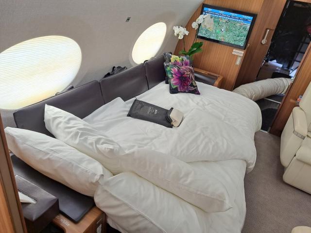 I toured a private jet for the first time — it had 7 beds and 2 