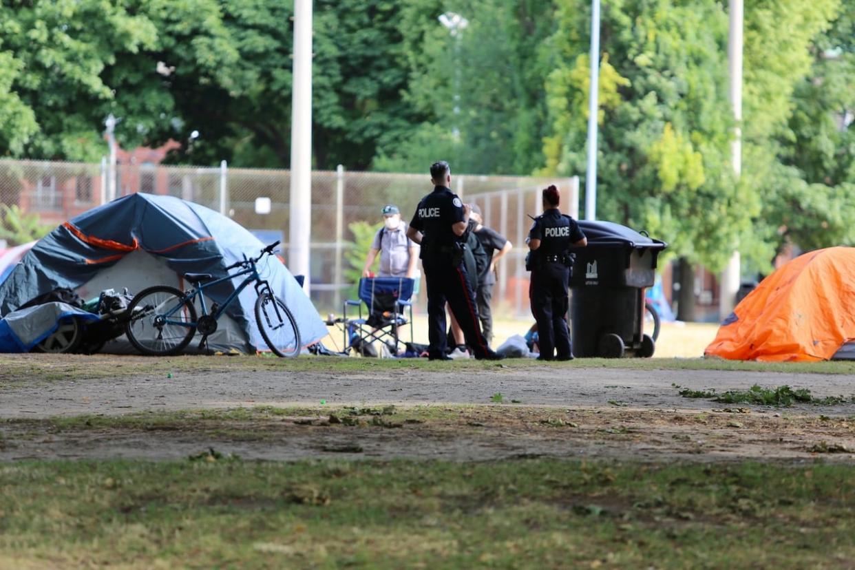 The City of Toronto has released a new report outlining an approach to homeless encampments that it says focuses more on supporting people living in them, than enforcement and removal. (Martin Trainor/CBC - image credit)