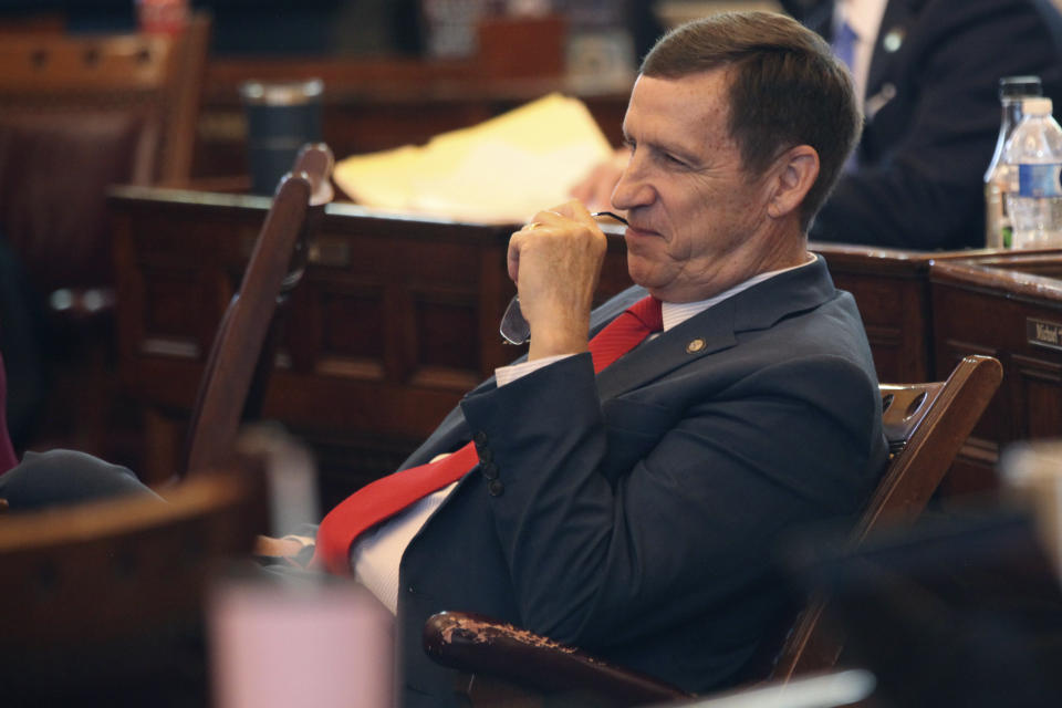 Kansas state Sen. Dennis Pyle, R-Hiawatha, follows a Senate debate on overriding Democratic Gov. Laura Kelly's veto of a package of tax cuts worth $1.5 billion over three years, Monday, April 29, 2024, at the Statehouse in Topeka, Kan. Pyle is among three dissident GOP senators who opposed overriding the veto, preventing it from occurring. (AP Photo/John Hanna)