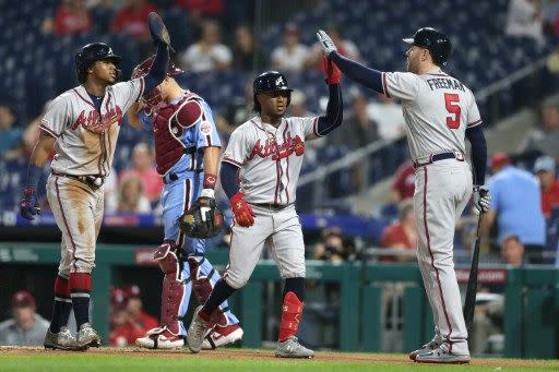 福里曼（Freddie Freeman，右）在勇士一直待的不錯。法新社