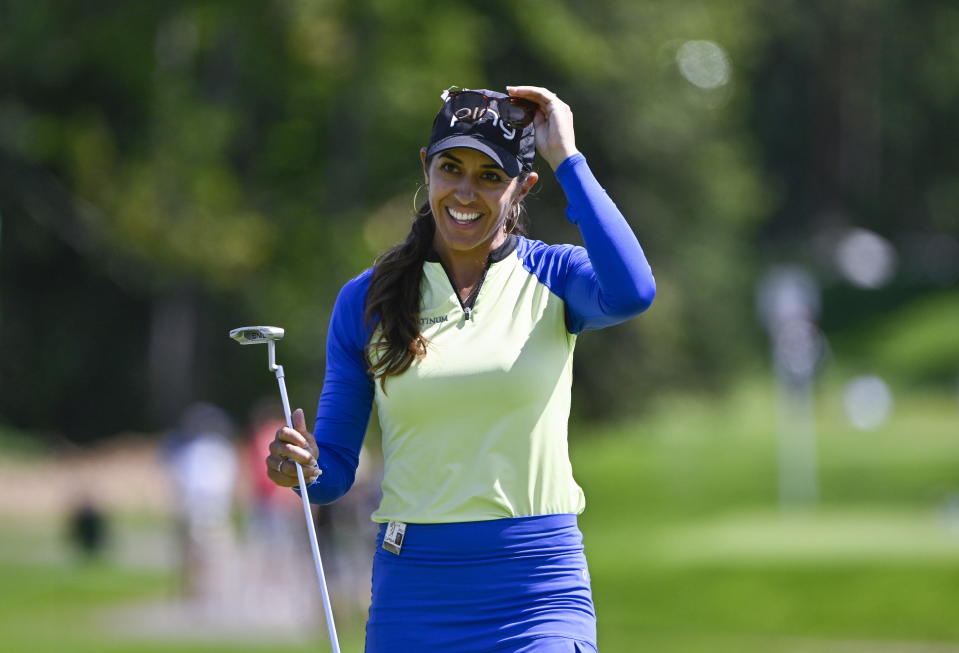 Paula Reto of South Africa smiles after her putt on the green of the 8th hole during the final round of the Canadian Pacific Women's Open golf tournament in Ottawa, Ontario, Canada, on Sunday, Aug. 28, 2022. (Justin Tang/The Canadian Press via AP)