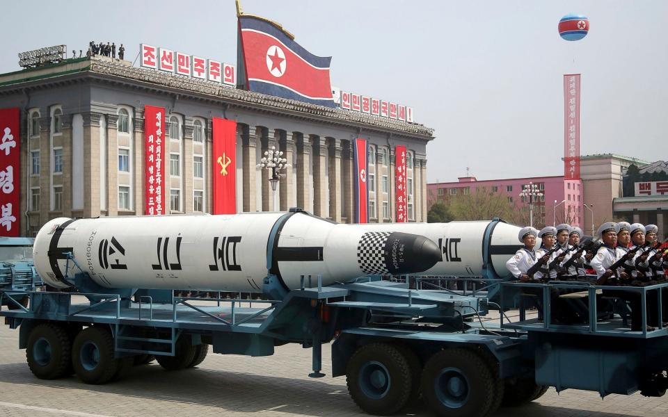 A submarine-launched ballistic missile is displayed in Kim Il-sung Square during a military parade in Pyongyang - Credit: AP