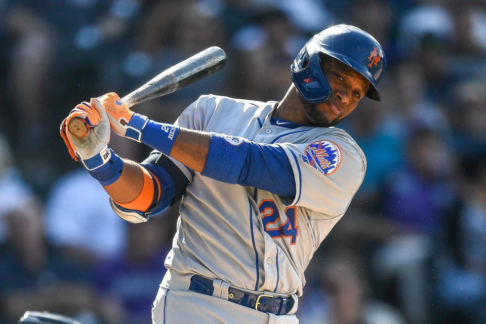 DENVER, CO - SEPTEMBER 18: New York Mets second baseman Robinson Cano (24) swings as he steps out of the box in a plate appearance against the Colorado Rockies during a game on September 18, 2019 at Coors Field in Denver, Colorado.  (Photo by Dustin Bradford/Icon Sportswire via Getty Images)